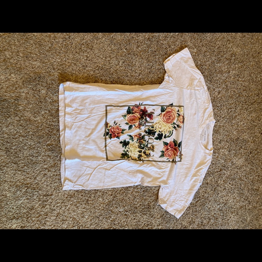 the 1975 tee